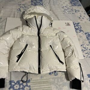 SAM. Glossy White Puffer Jacket with Black Accents